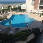 Отель Tritone Каорле